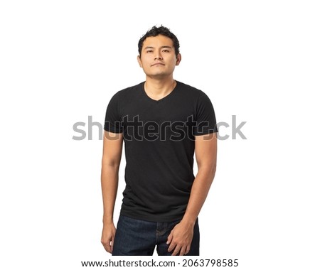 Young man, dark skin, Hispanic, Mexican, Latino, with Chinese hair wearing black shirt and jeans, on white background Royalty-Free Stock Photo #2063798585