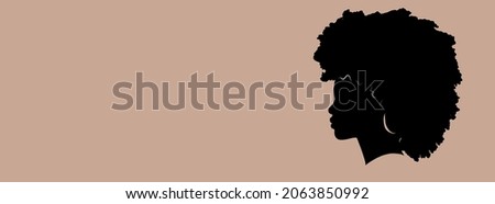 Beautiful African American Woman, Silhouette Profile in Black, Curly afro Hair.