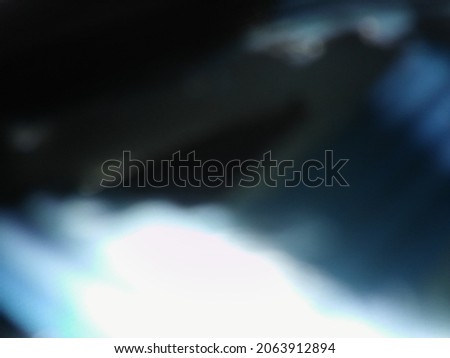 Abstract black blue shiny wallpaper with different elements and blurry effects