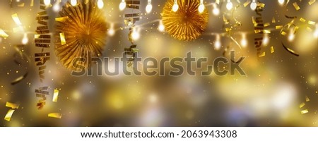 beautiful golden party decoration background with copy space, festive frame of confetti, garlands and lights, cheerful concept for xmas, holiday season, carnival, birthday, wedding, anniversary