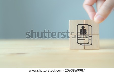 Buyer persona and target customer concept. Customer psychology profile or characteristics. Marketing analysis for business plan. Hand holds wood cubes with buyer information or employee qualification.
