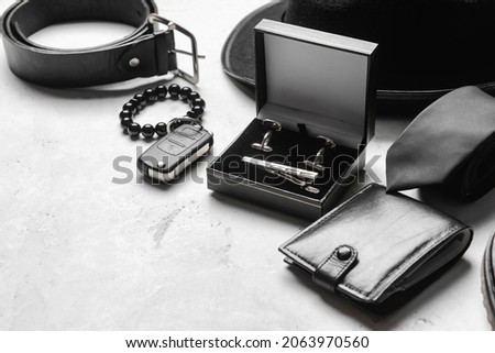 Set of stylish male accessories on table, closeup Royalty-Free Stock Photo #2063970560