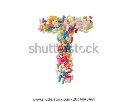 Multi color sugar sprinkles letter T on white background