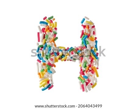 Multi color sugar sprinkles letter H on white background