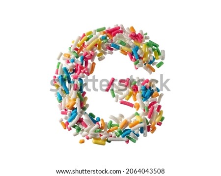 Multi color sugar sprinkles letter G on white background