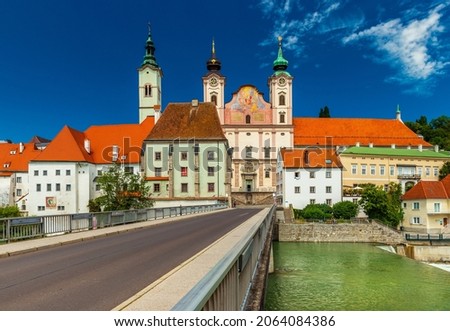 View of the St. Michael's Church and the Zwischenbrucken bridge in the city of Steyr, Austria Royalty-Free Stock Photo #2064084386