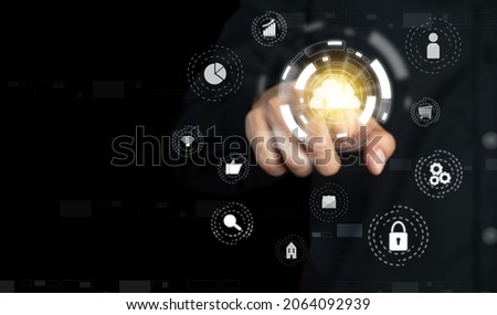 Businessman touching virtual image cloud computing technology on a black background. social media, search, beginning of a new era. Marketing plans and business growth. Network connection concept.