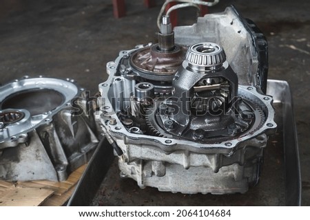 Gear Differential Assembly ,Automatic Transmission Rebuild in Garage services. Royalty-Free Stock Photo #2064104684