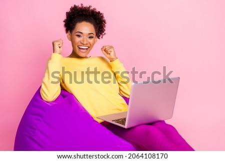 Photo of hooray millennial brunette lady look laptop wear shirt jeans isolated on pink background