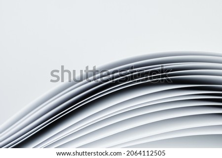 Sheets of white paper on white background. Abstract background.