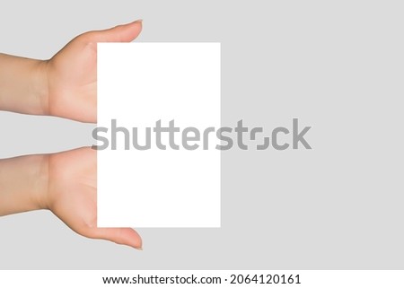 Classic and universal mock up with in woman open hands and white card