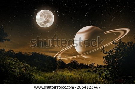 Fantasy night view with moon and Saturn