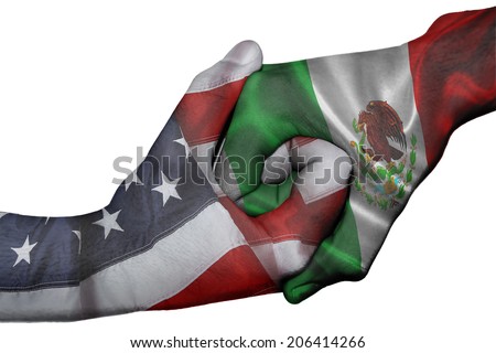 Diplomatic handshake between countries: flags of United States and Mexico overprinted the two hands Royalty-Free Stock Photo #206414266