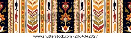 Ikat geometric folklore ornament. Tribal ethnic vector texture. Seamless striped pattern in Aztec style. Figure tribal embroidery. Indian, Scandinavian, Gypsy, Mexican, folk pattern. Royalty-Free Stock Photo #2064342929