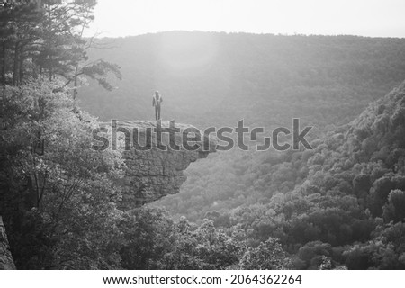 View of Hawkbill Crag (Whitaker Point) in the Ozark National Forest near the Buffalo National River with a person standing on it. Royalty-Free Stock Photo #2064362264