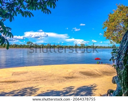 River Inirida… Rio Inirida, Guainia, Colombia. Royalty-Free Stock Photo #2064378755