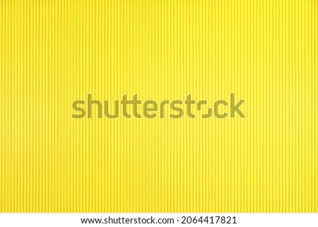Bright vivid Pantone yellow vertical steady stripes straight lines pattern corrugated cardboard carton design abstract texture background wallpaper, High resolution, colorful.