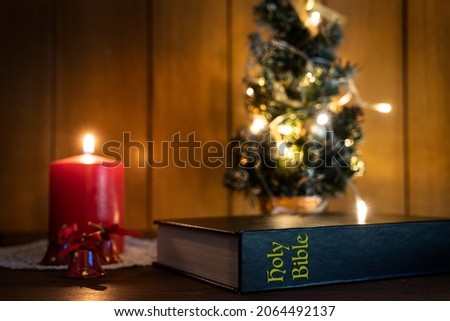 the bible book on a table at Christmas time