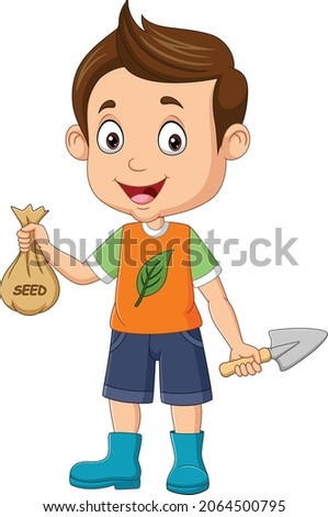 Cute little boy holding seed sack and shovel