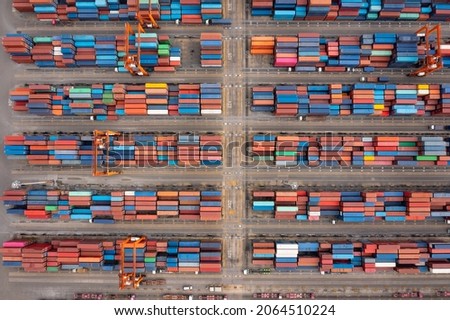 Group of objects container warehouse and cranes load unloading stacking in a row photograph aerial top view from drone Point view 