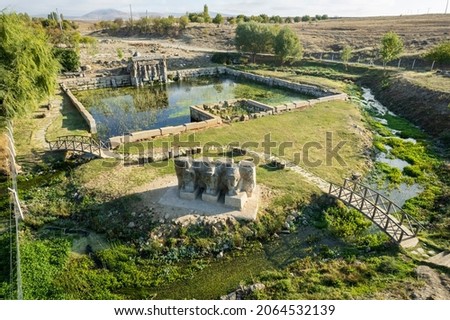 The Hittite spring sanctuary of Eflatun Pinar lies about 100 kilometres west of Konya close to the lake of Beysehir in a hilly, quite arid landscape. Royalty-Free Stock Photo #2064532139