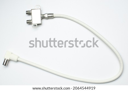 Old electric power cable plug television signal socket isolated on white background soft shadow