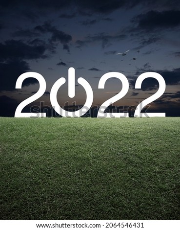 2022 start up business flat icon with green grass field over sunset sky, Happy new year 2022 cover concept