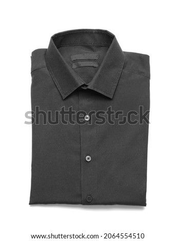 Folded male shirt on white background