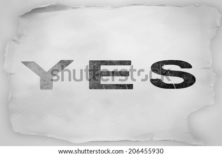 The word Yes on old paper background