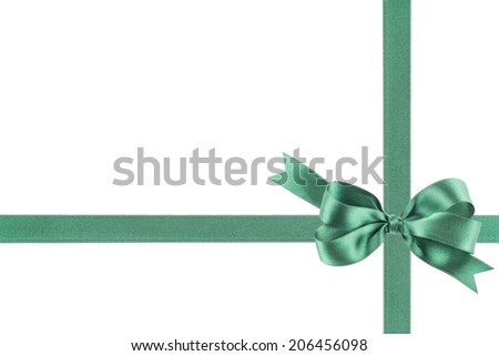 Green ribbon with a bow on white background
