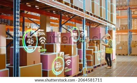 Futuristic Technology Retail Warehouse: Worker Starts Inventory Digitalization with Barcode Scanner Analyzes Goods, Cardboard Boxes, Products. Delivery Infographics in Logistics, Distribution Center