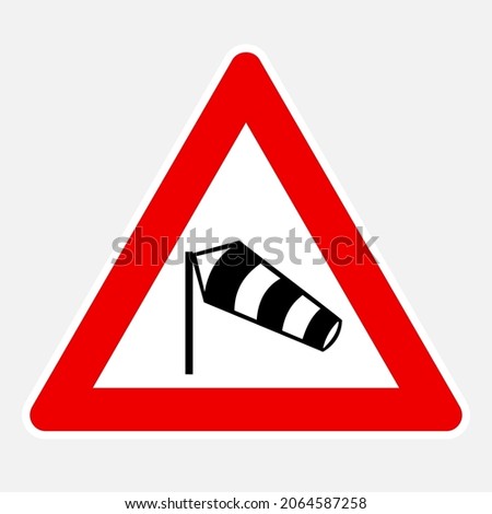 Dangerous crosswinds ahead vector triangular red road sign Royalty-Free Stock Photo #2064587258