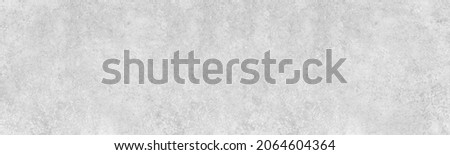 Textured light gray wall wide panoramic texture. Grunge grey plaster large long surface. Abstract widescreen background