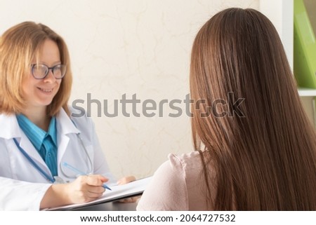 teenager in medical clinic for doctor's consultation,patient in a medical office receives treatment and medical care