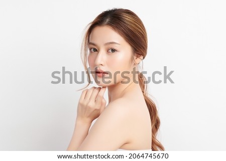 Beautiful young asian woman with clean fresh skin on white background, Face care, Facial treatment, Cosmetology, beauty and spa, Asian women portrait. Royalty-Free Stock Photo #2064745670