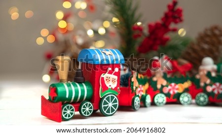 santa claus christmas locomotive on white wooden background with bokeh ,christmas concept