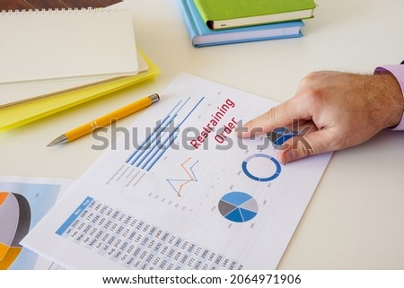 Financial concept about Restraining Order with phrase on the sheet. 
 Royalty-Free Stock Photo #2064971906