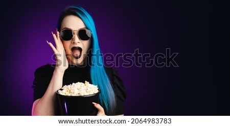 Large banner Woman in black friday, shopping, expressions, with sunglasses, surprised face, and other expressions, with popcorn bucket in hand, blue hair, copy space, black background, neon style 