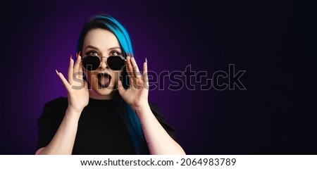 Large banner Woman in black friday, shopping, expressions, with sunglasses, surprised face, and other expressions blue hair, copy space, black background, neon style for websites, billboards and signs