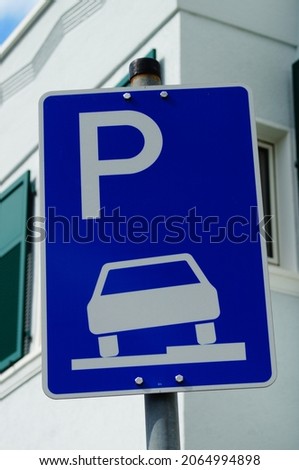 Sign: Vehicles may park partially on pavement in the direction of travel  German traffic sign no  315-55 