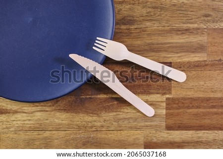 A studio photo of wooden cutlery