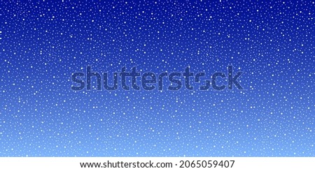 Snowfall on blue sky background, winter background Royalty-Free Stock Photo #2065059407