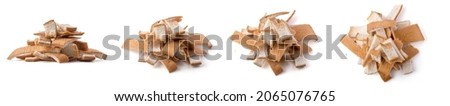 pile of leftover bread crust, use to make bread crumbs, isolated on white background, closeup view in different angles Royalty-Free Stock Photo #2065076765