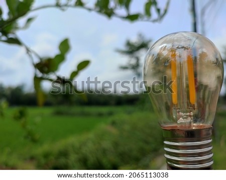 Lamp and village scene in Indonesia