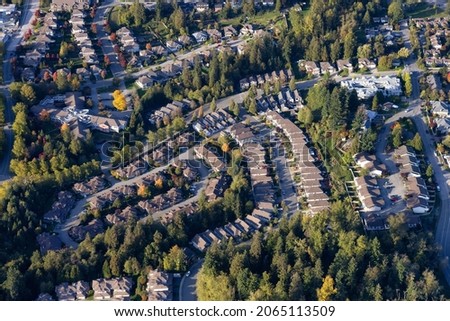 Residential Homes in Maple Ridge City in Greater Vancouver, British Columbia, Canada. Aerial View from Airplane. Sunny Fall Season. Royalty-Free Stock Photo #2065113509