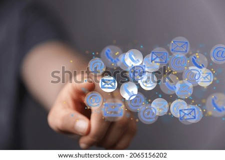 A hand clicking at email icons-communication and feedback concept