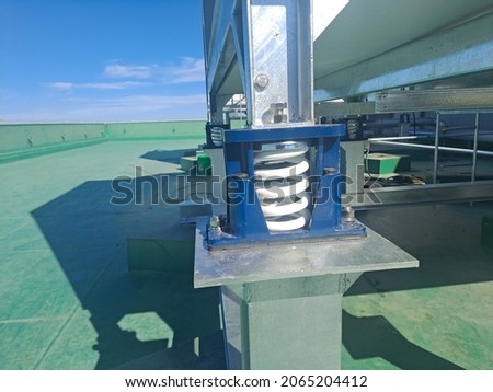 Anti-vibration mount of building cooling tower Royalty-Free Stock Photo #2065204412