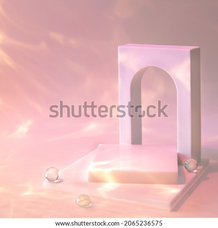 Abstract surreal scene - empty stage with square podium and arch on pink pastel background with glass beads in water. Pedestal for cosmetic, beauty product, packaging mockups presentation