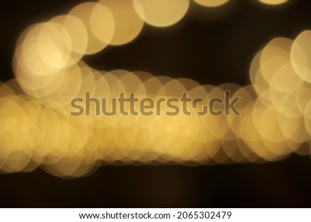 A background of yellow bulbs