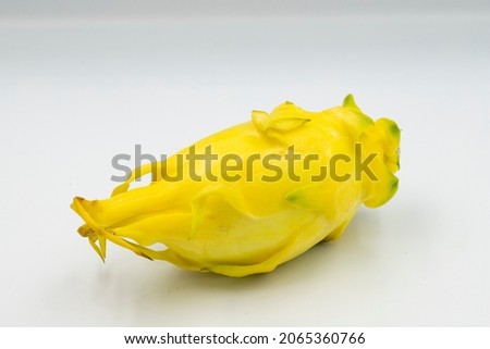 Yellow dragon Fruit isolated white background with shadow. close up